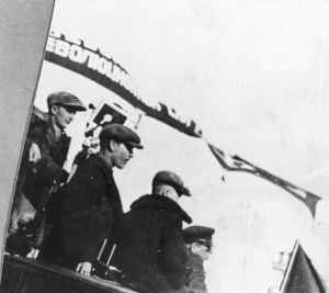Vertov with camera and colleagues while shooting "Ėntuziazm"