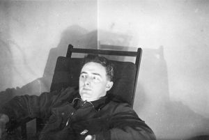 Vertov wearing a seaman's pullover in a deckchair
